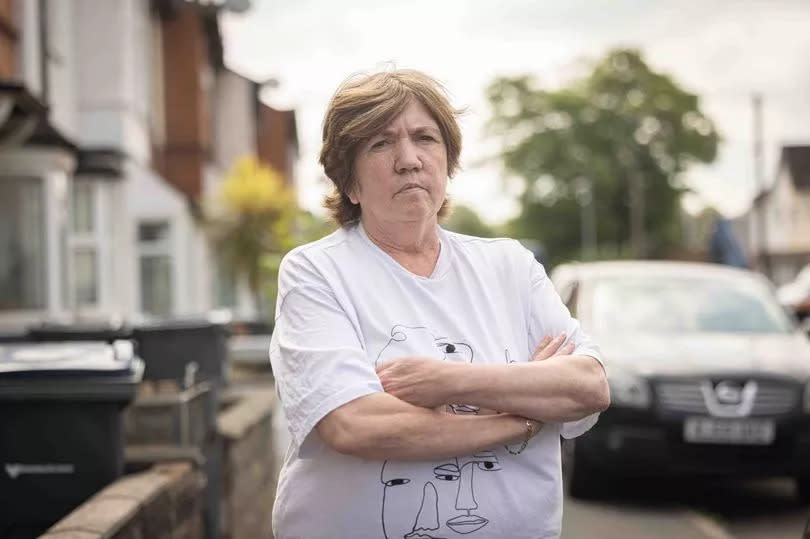 Geraldine White outside her temporary home