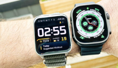 Close up of the Garmin Venu X1 smartwatch next to the Apple Watch Ultra 2