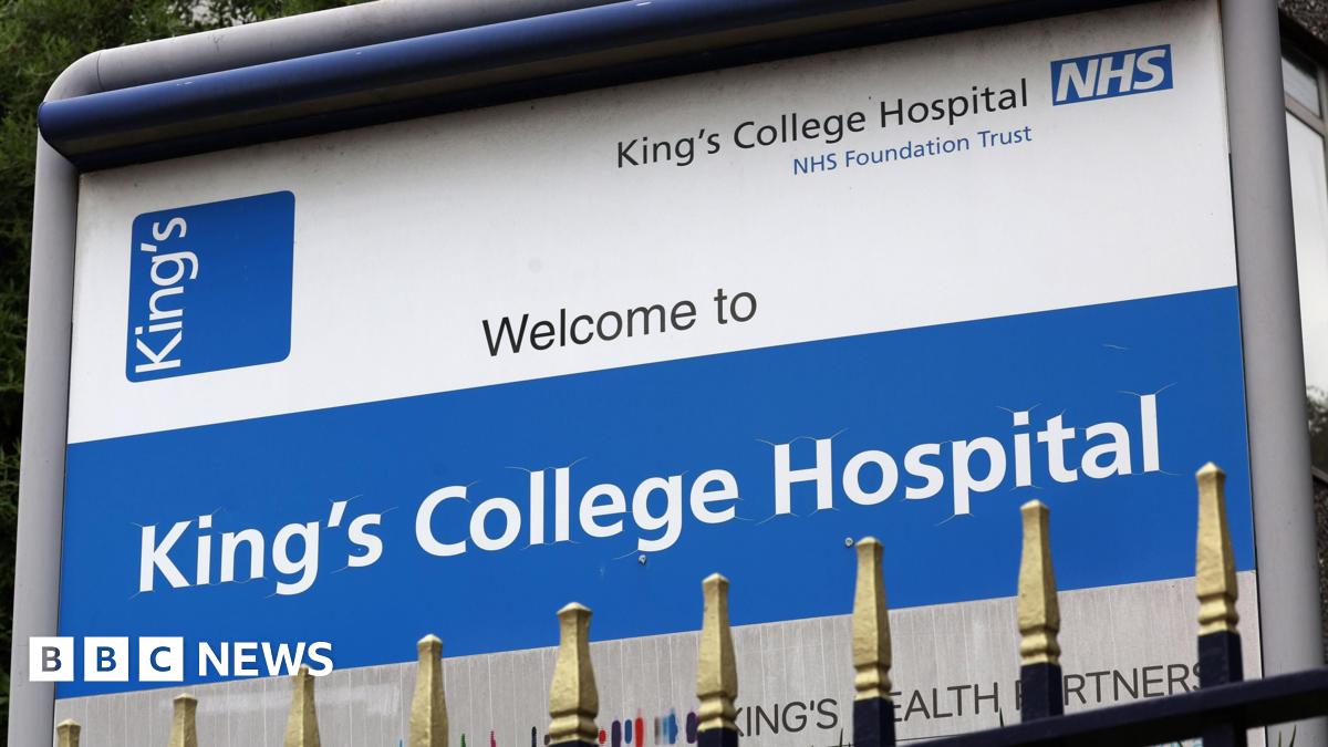 A sign for King's College Hospital, featuring an NHS logo