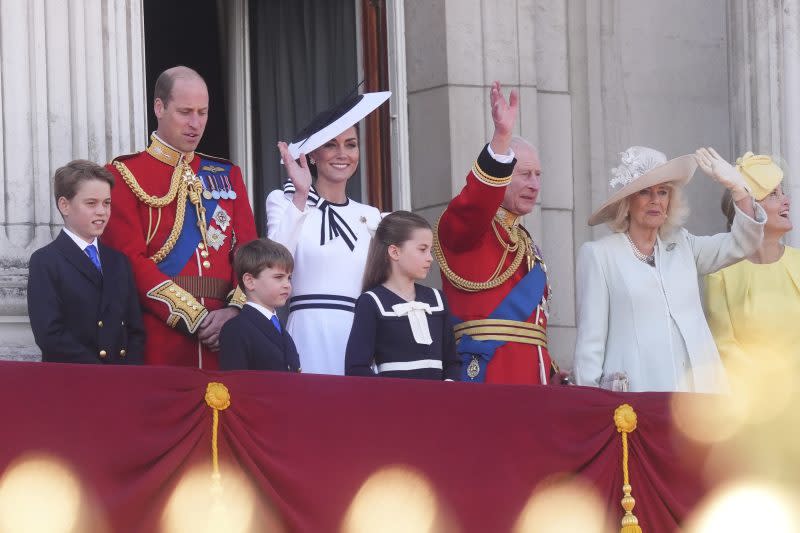 From left, Britain’s Prince George, Prince William, Prince Louis, Kate, Princess of Wales, Princess Charlotte, King Charles III, Queen Camilla and Sophie, Duchess of Edinburgh on the balcony of Buckingham Palace to view the flypast following the Trooping the Color ceremony in London, Saturday, June 15, 2024. Trooping the Color is the King’s Birthday Parade and one of the nation’s most impressive and iconic annual events attended by almost every member of the Royal Family. (James Manning/PA via AP)