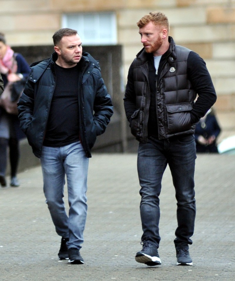 Eddie Lyons Jnr and Ross Monaghan walking.
