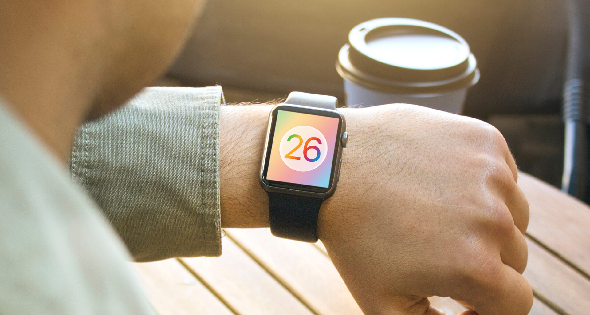 A render of the watchOS 26 logo on an Apple Watch.