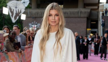 Fergie Walks Red Carpet in Feathers for London Premiere of 'Too Much'