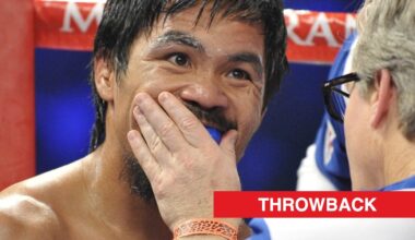 Manny Pacquiao has his gumshield put in by Freddie Roach in his corner