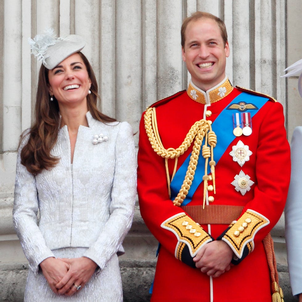 london, united kingdom june 014: (embargoed for publication in uk newspapers until 48 hours after create date and time) catherine, duchess of cambridge and prince william, duke of cambridge watch the fly past from the balcony of buckingham palace during trooping the colour, queen elizabeth iis birthday parade on june 14, 2014 in london, england. (photo by max mumby/indigo/getty images)