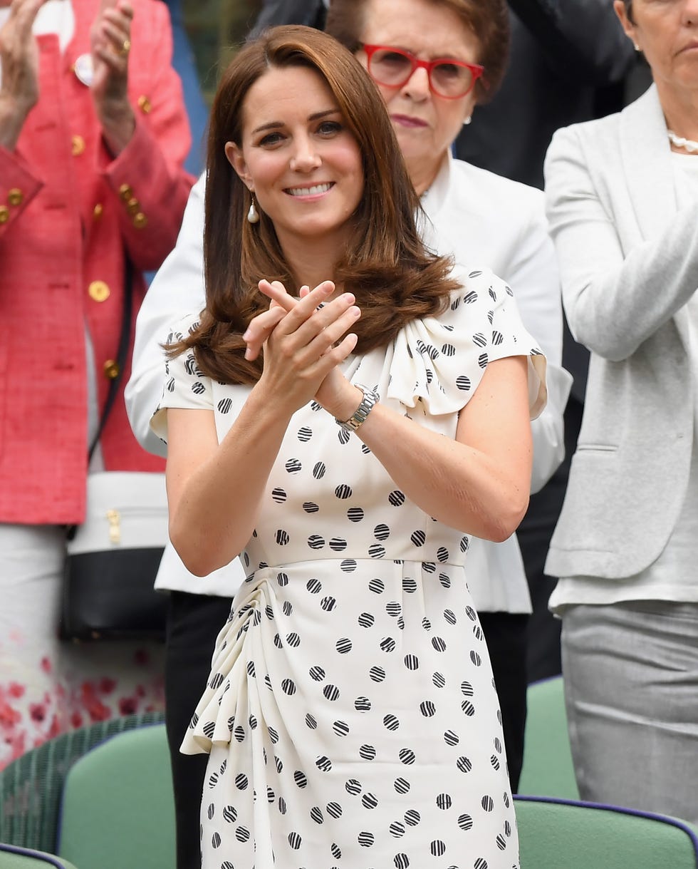 london, england july 14: catherine, duchess of cambridge and meghan, duchess of sussex attends day twelve of the wimbledon tennis championships at the all england lawn tennis and croquet club on july 13, 2018 in london, england. (photo by karwai tang/wireimage )