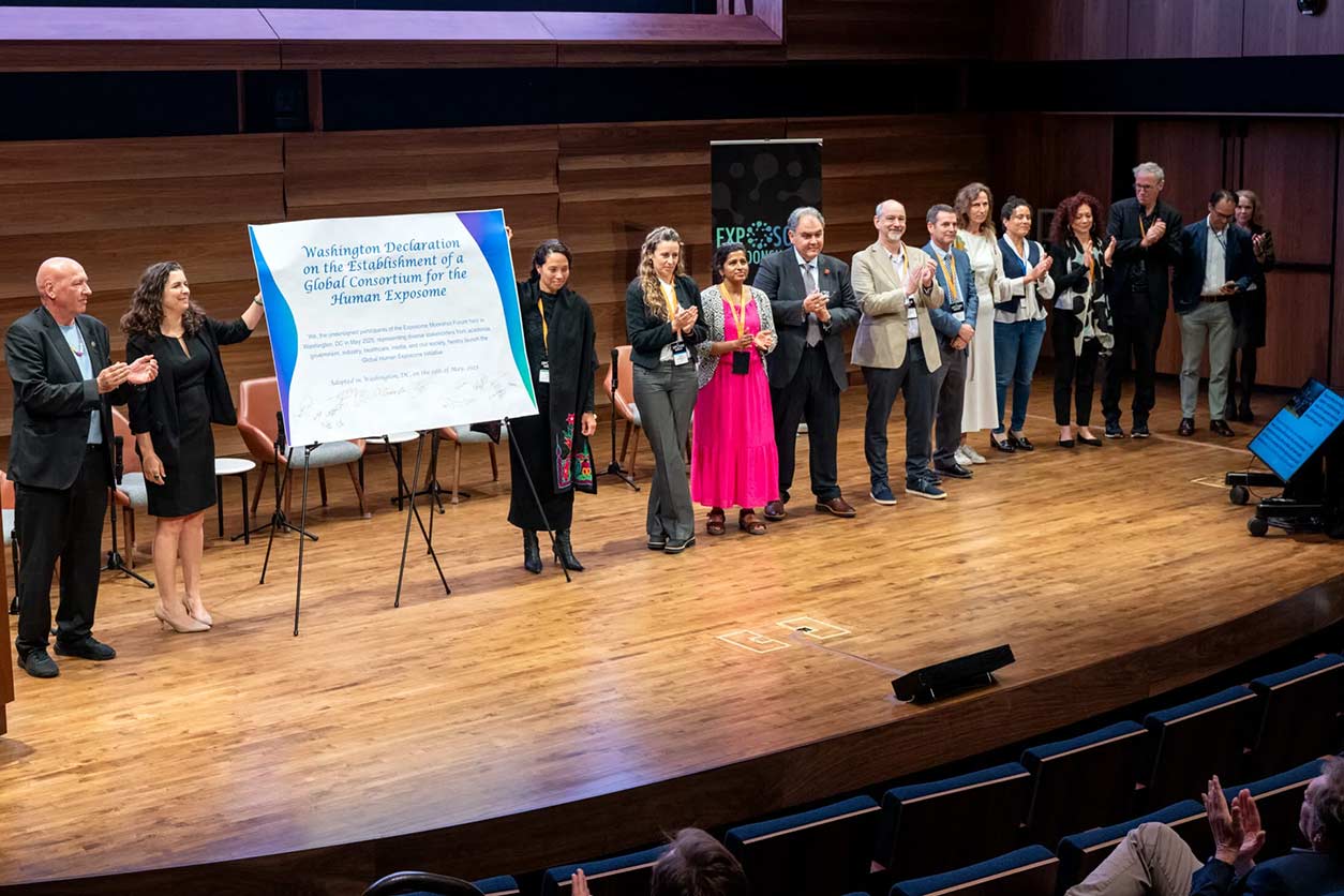 Organizing committee members, including leaders from NIH, NIEHS, and the National Center for Advancing Translational Sciences, celebrate establishment of a global exposome consortium.