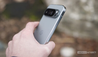 Someone holding the Google Pixel 9 Pro outside.