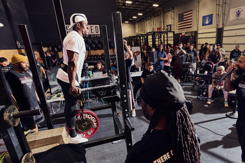 competition setting at a gym with athletes and spectators
