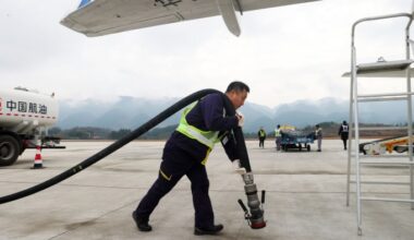 Man with aviation fuel pump