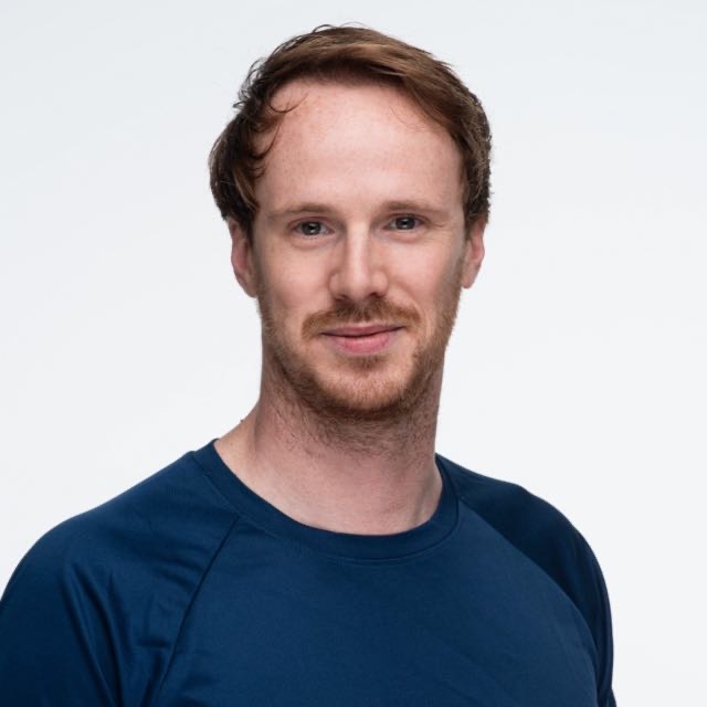 Headshot of Alex Partridge.