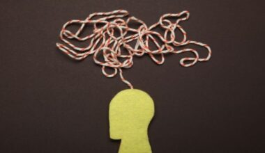 Image of a cutout person with a string coming out of its head
