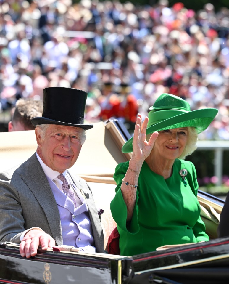 King Charles III and Queen Camilla in a carriage at Royal Ascot.