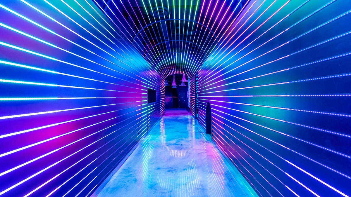 A tunnel full of glowing light lines