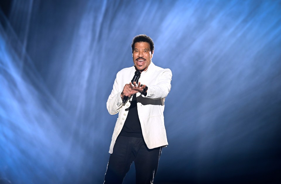 Lionel Richie performing on stage.