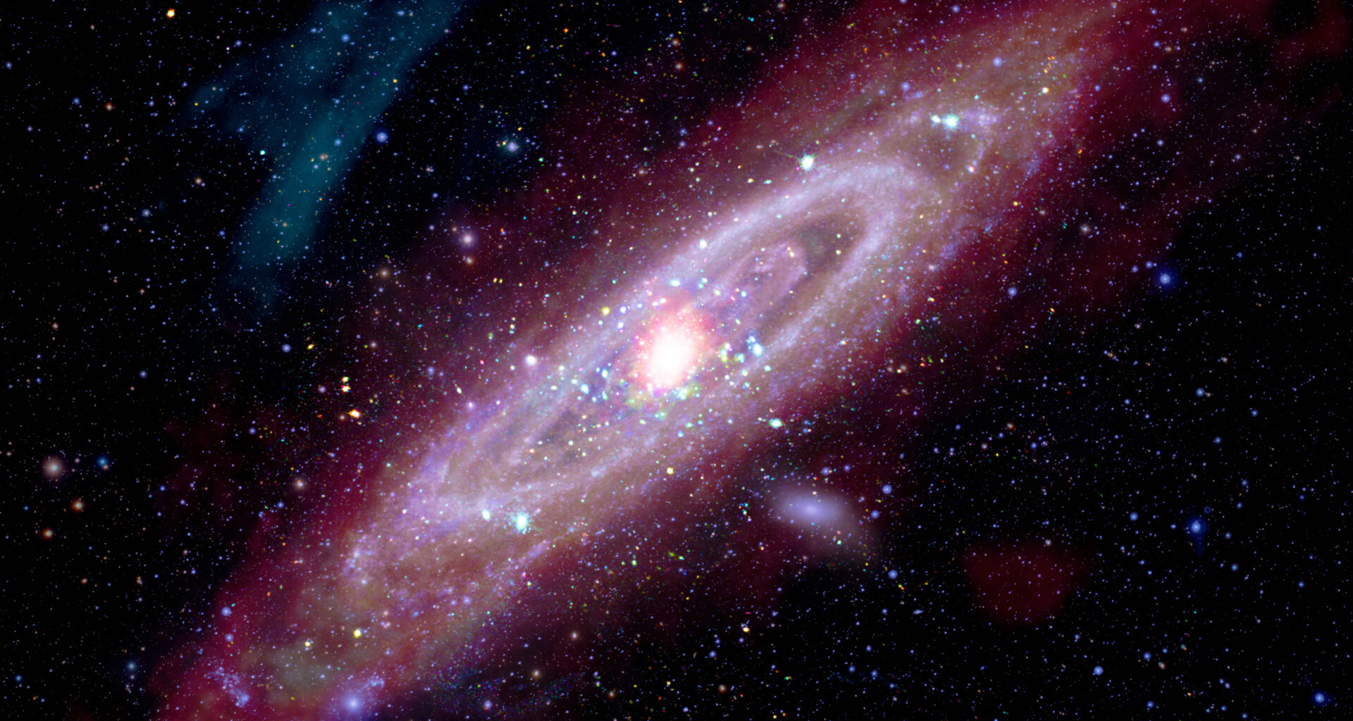 Astronomers study Andromeda (Messier 31, or M31) to understand the structure and evolution of our own spiral galaxy, the Milky Way. This new composite image contains data of M31 includes X-rays from Chandra and XMM-Newton, ultraviolet data from GALEX, optical data from astrophotographers using ground-based telescopes, infrared data from Spitzer, IRAS, COBE, Planck and Herschel, and radio data from the Westerbork Synthesis Radio Telescope. Each type of light reveals new information about this close galactic relative to the Milky Way.