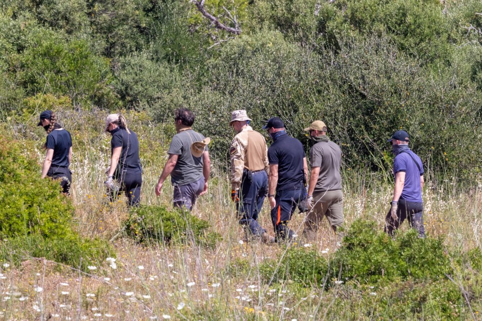 Police searching scrubland for evidence.