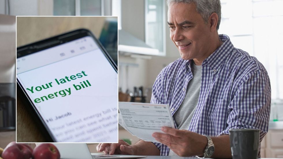 Man looking at letter and energy bill
