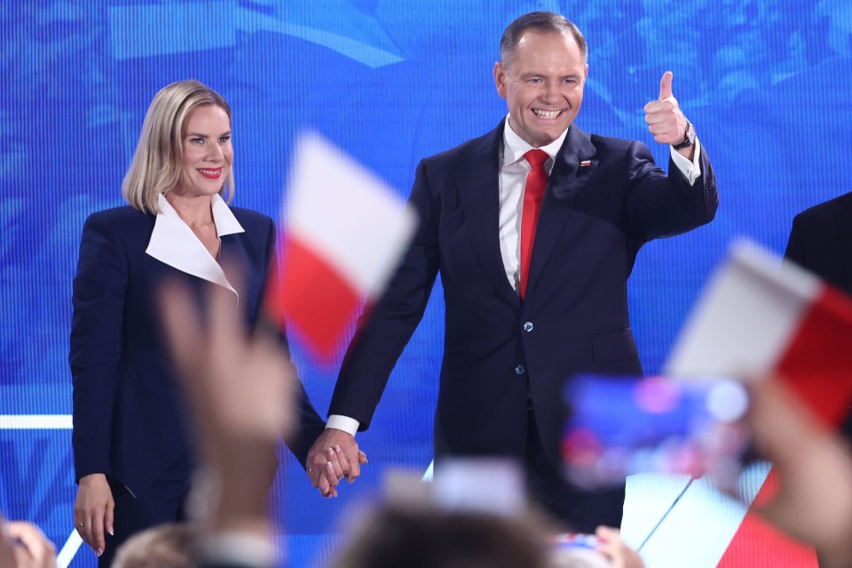 Marta Nawrocka and Karol Nawrocki at an election event.