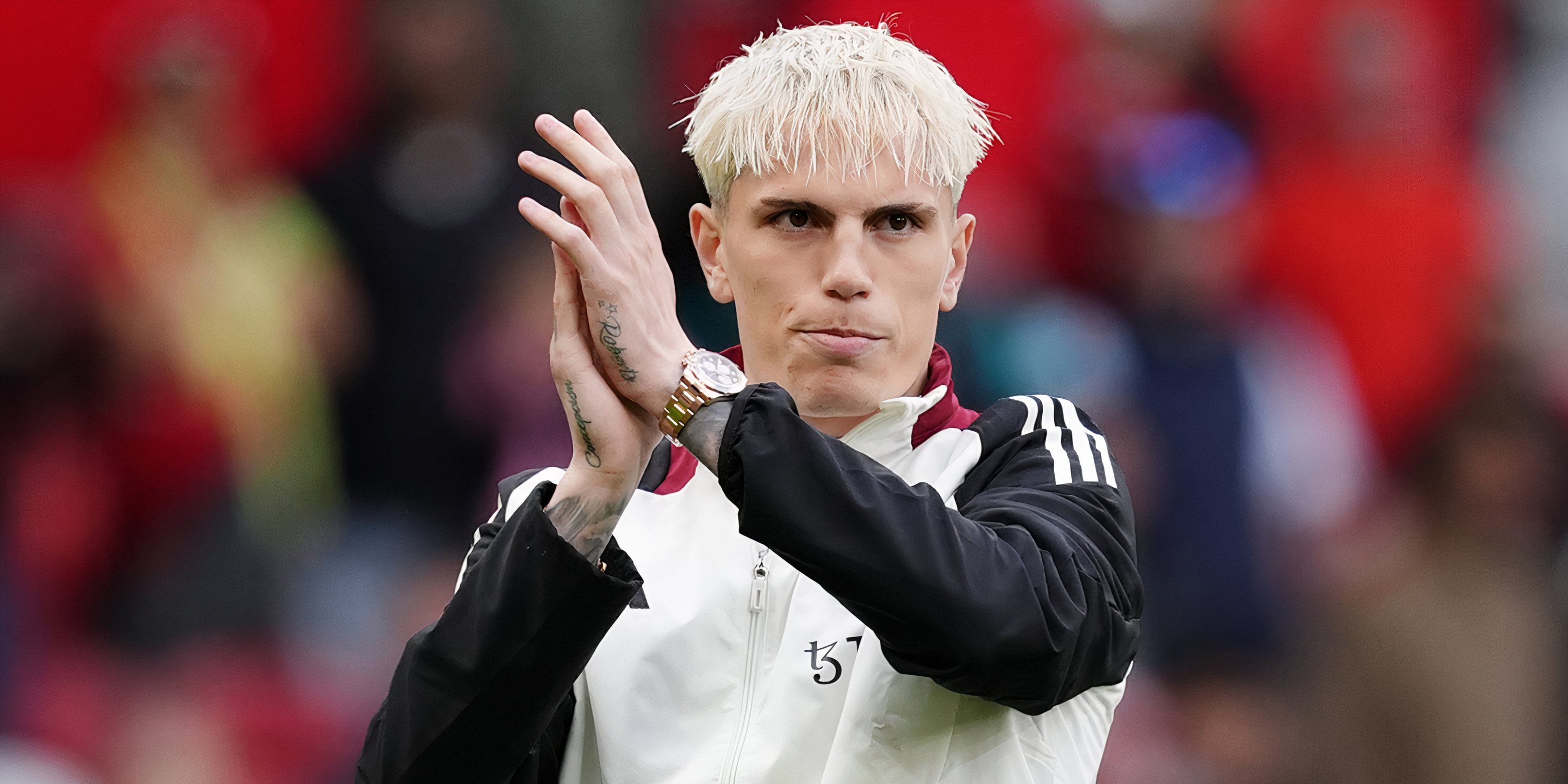 Alejandro Garnacho applauding the Manchester United supporters