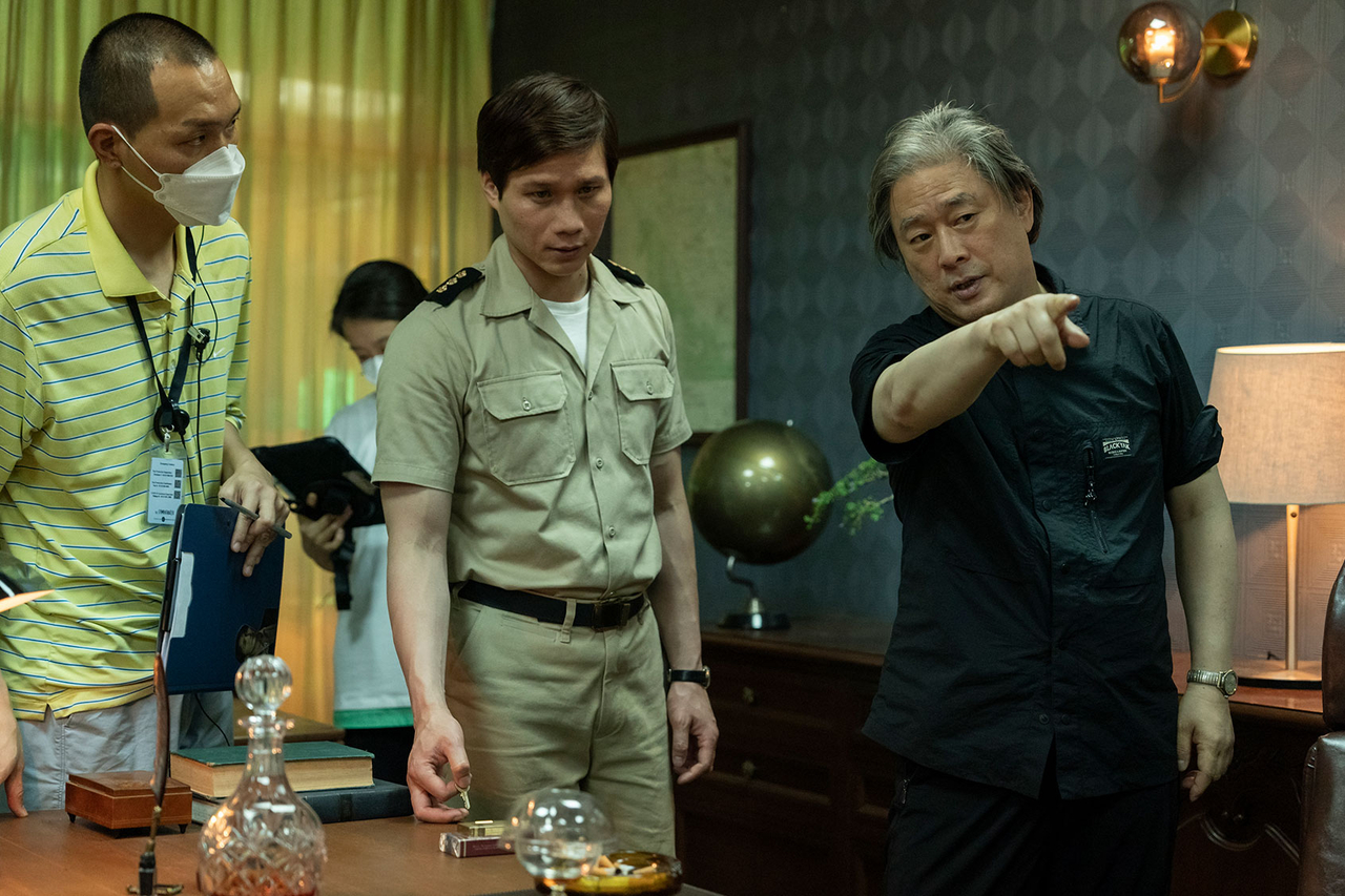 Director Park Chan-wook (right) with actor Hua Xuande on the set of "The Sympathizer" (HBO)