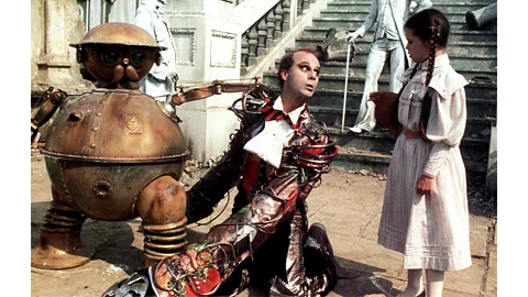 Alamy The Wheelers, a group of henchmen with wheels for feet, are one of the film's most disturbing elements (Credit: Alamy)
