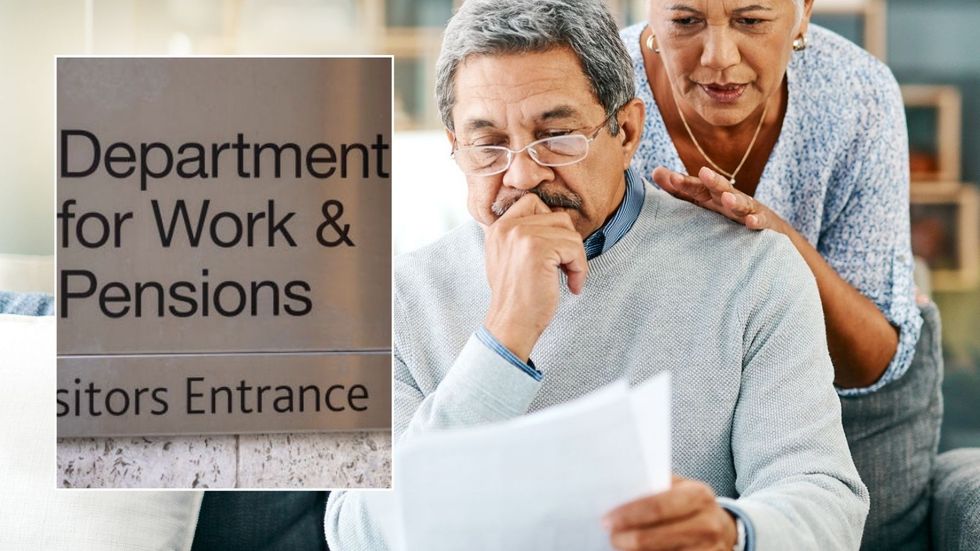 Pensioners looking at letter and DWP