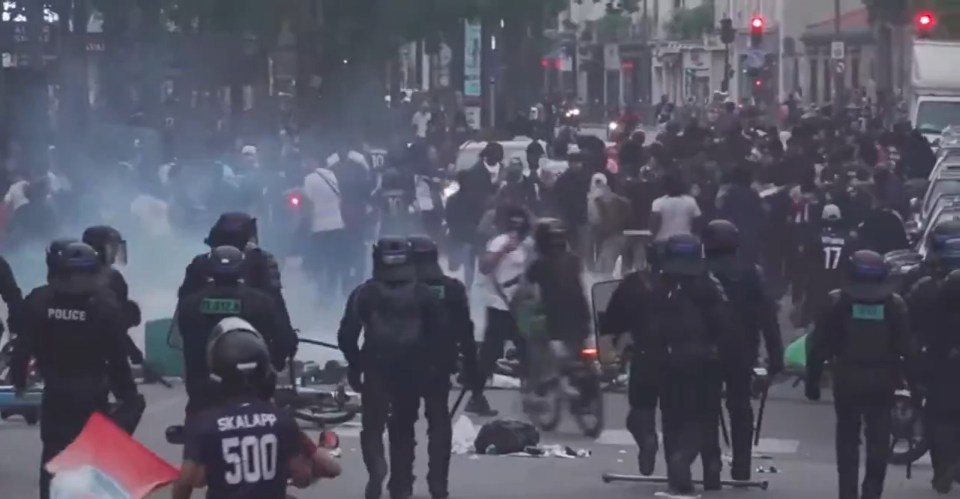 Riot police ran towards a large group of fans in the city