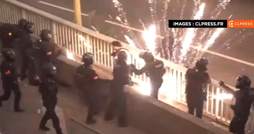 A firework exploded in front of officers in Paris