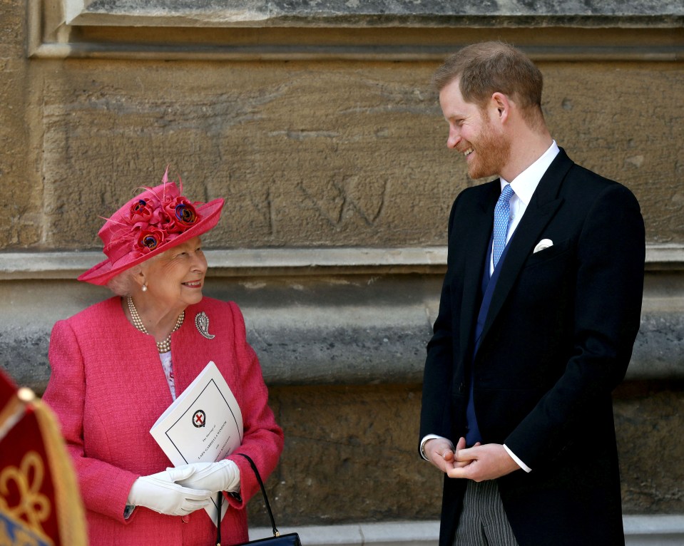 Queen Elizabeth II and Prince Harry at a wedding.