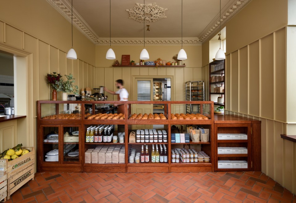 Interior view of Lannan Bakery, showing pastries and shelves of products.