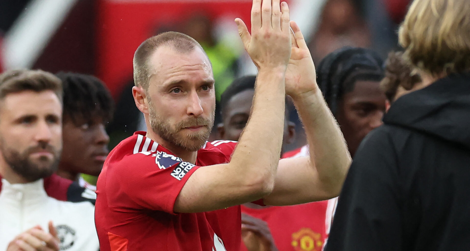 Christian Eriksen applauds the Manchester United fans after his final appearance for the club, against Aston Villa in the Premier League, in May 2025.