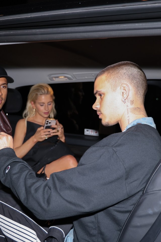 Romeo Beckham and Caroline Daur leaving a party in Paris.