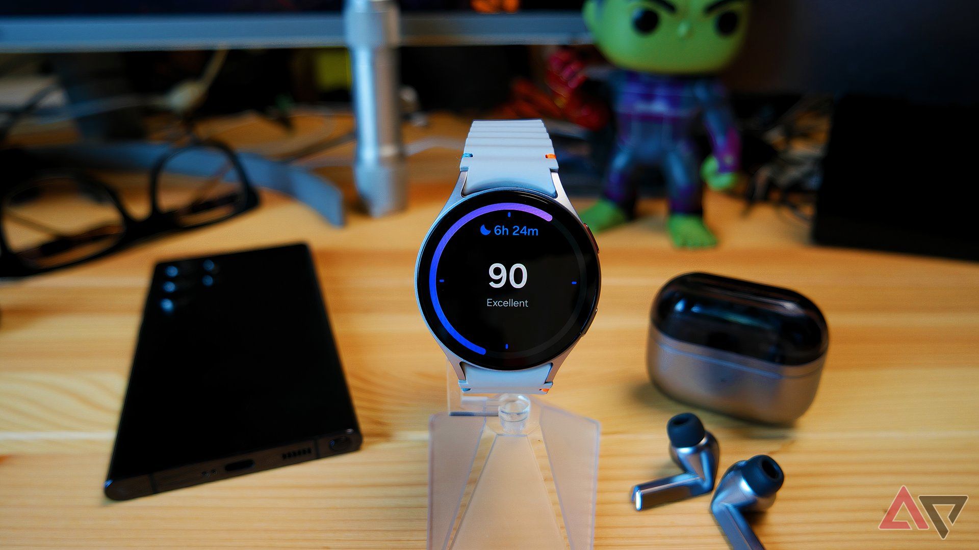 Samsung Galaxy Watch 7 on a watch stand showing the sleep number from the previous night
