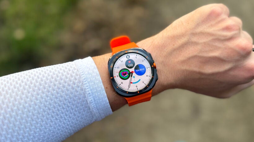 samsung-galaxy-watch-ultra on wrist with orange strap