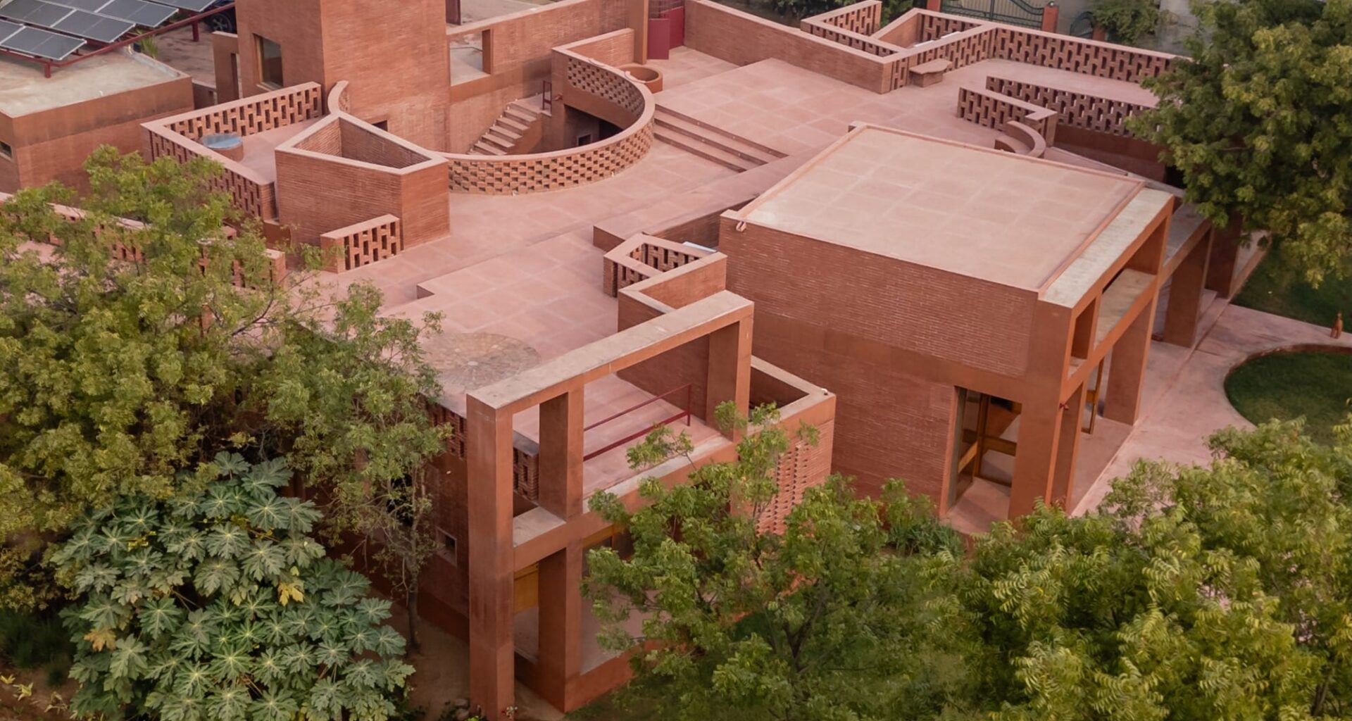 an aerial view of a contemporary brick home