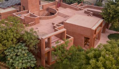 an aerial view of a contemporary brick home