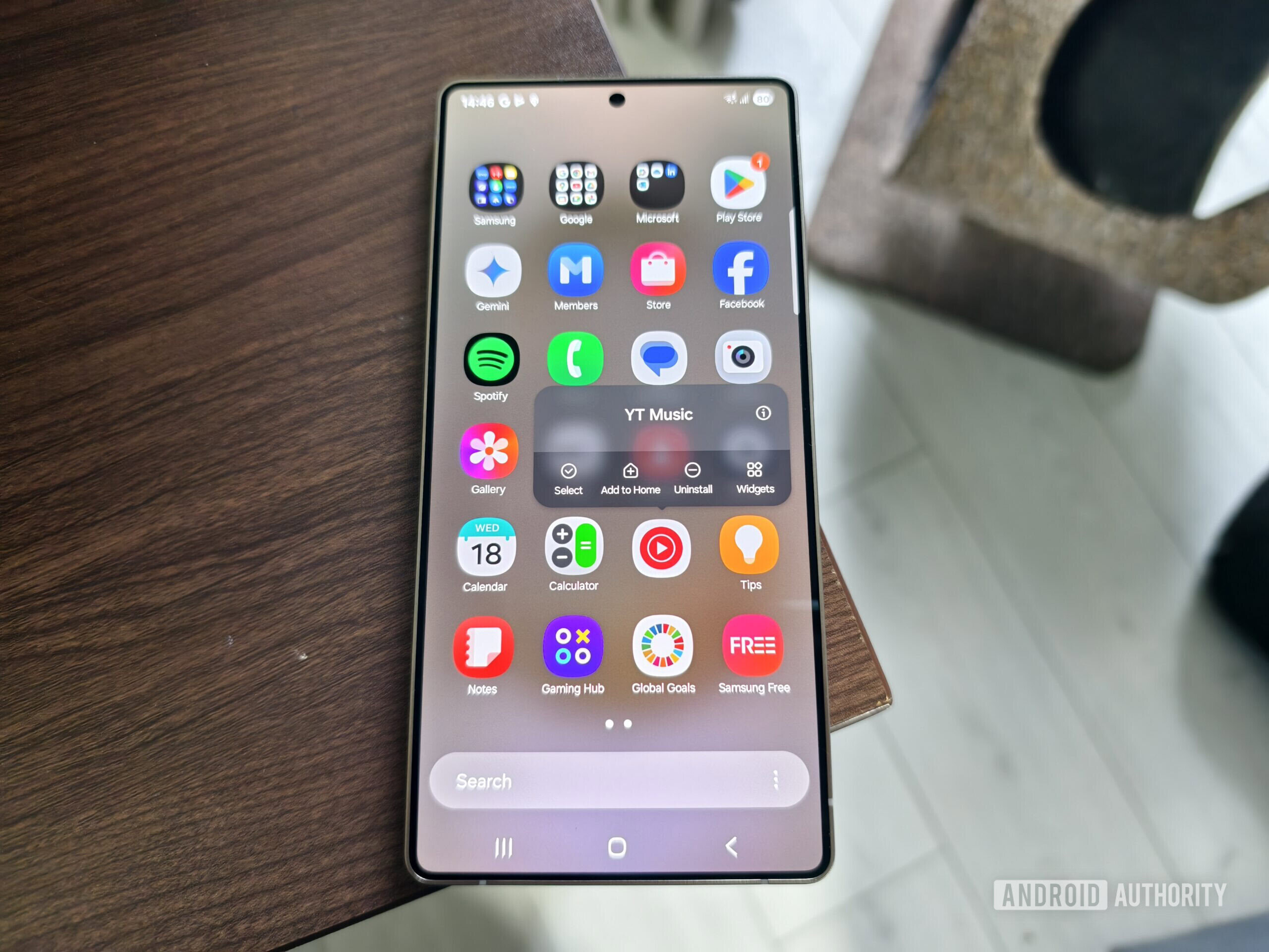 selecting the option to uninstall youtube music on a smartphone