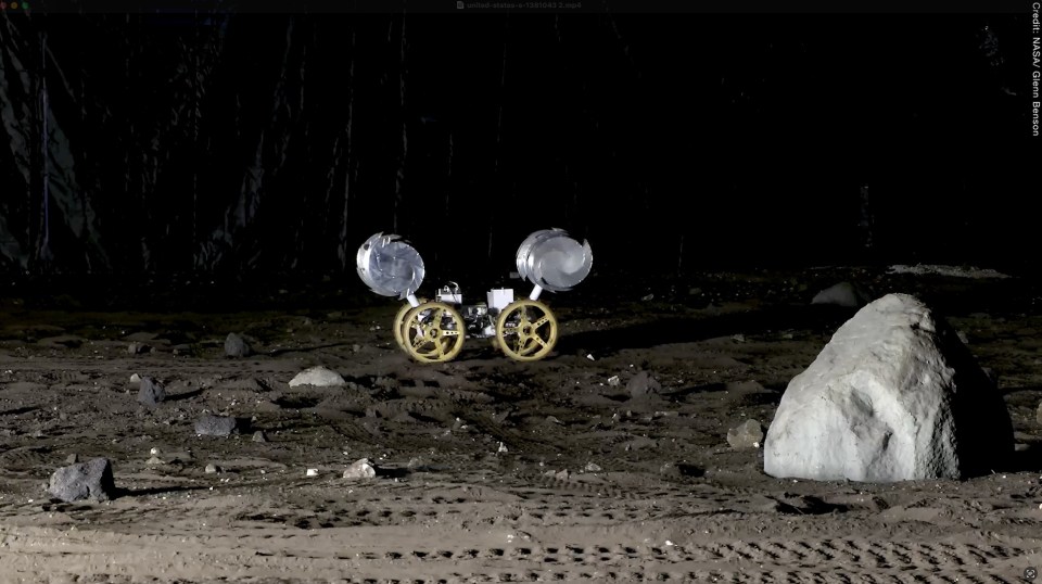 RASSOR robot excavating simulated lunar regolith.