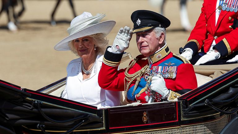 Britain's King Charles and Queen Camilla ride a carriage as part of the Trooping the Colour parade. Pic: Reuters
