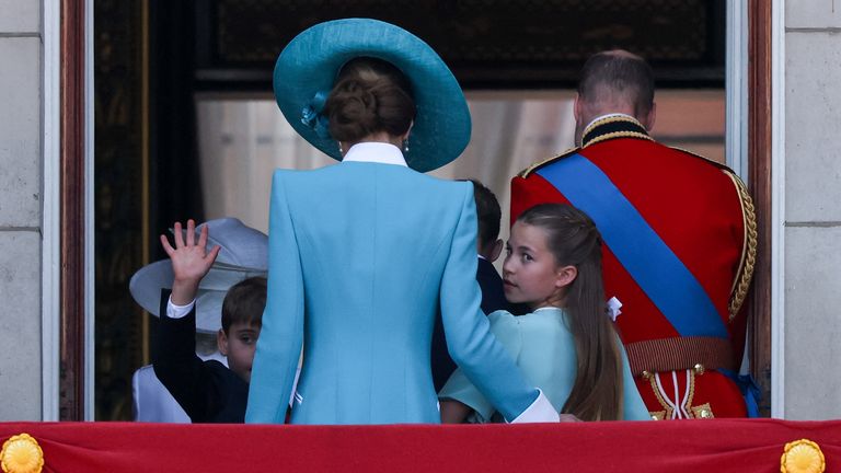 Prince Louis gives one final wave. Pic: Reuters