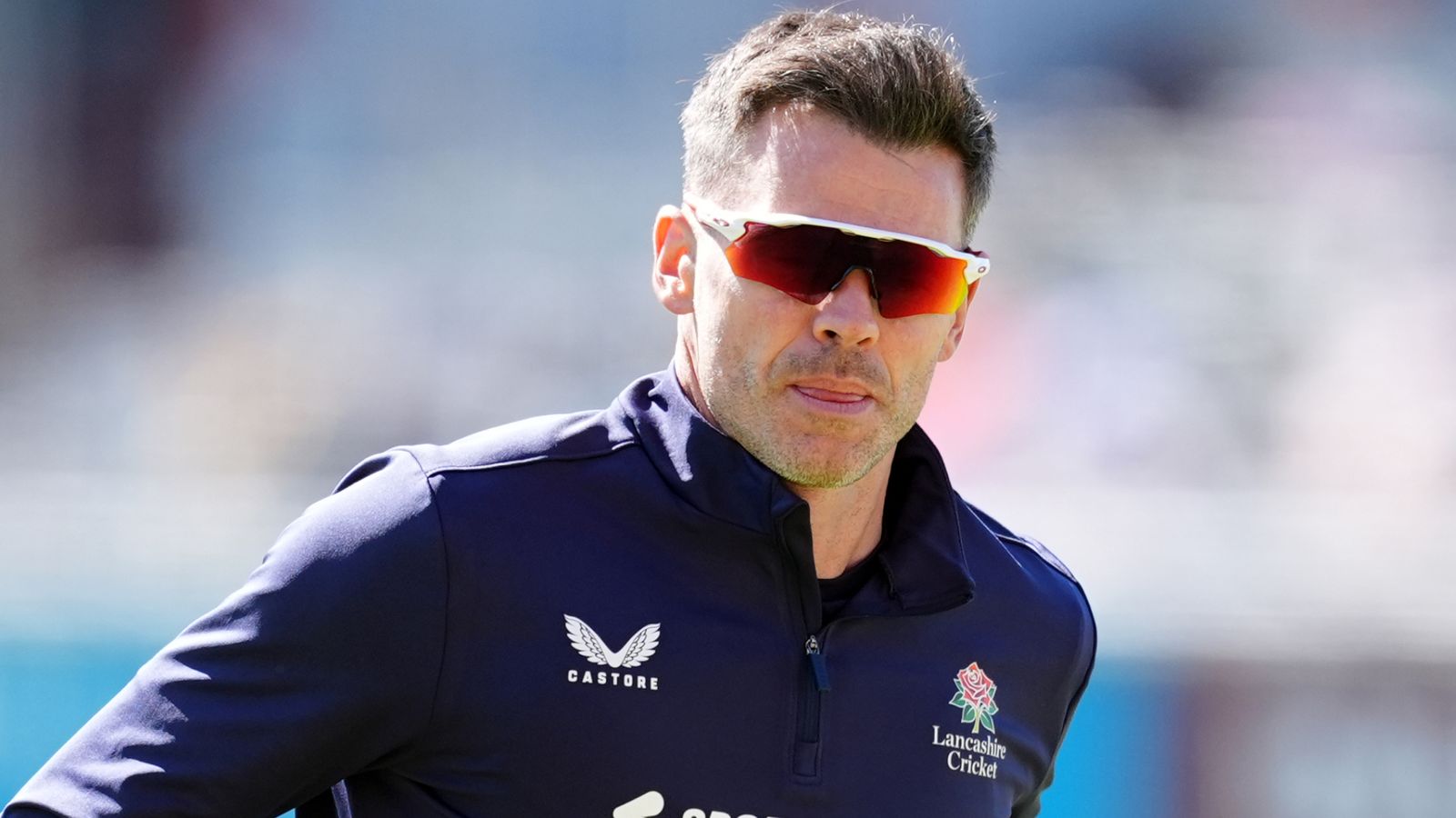 Lancashire's James Anderson warms up
