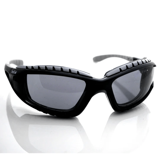 Black Bollé safety glasses with gray lenses.