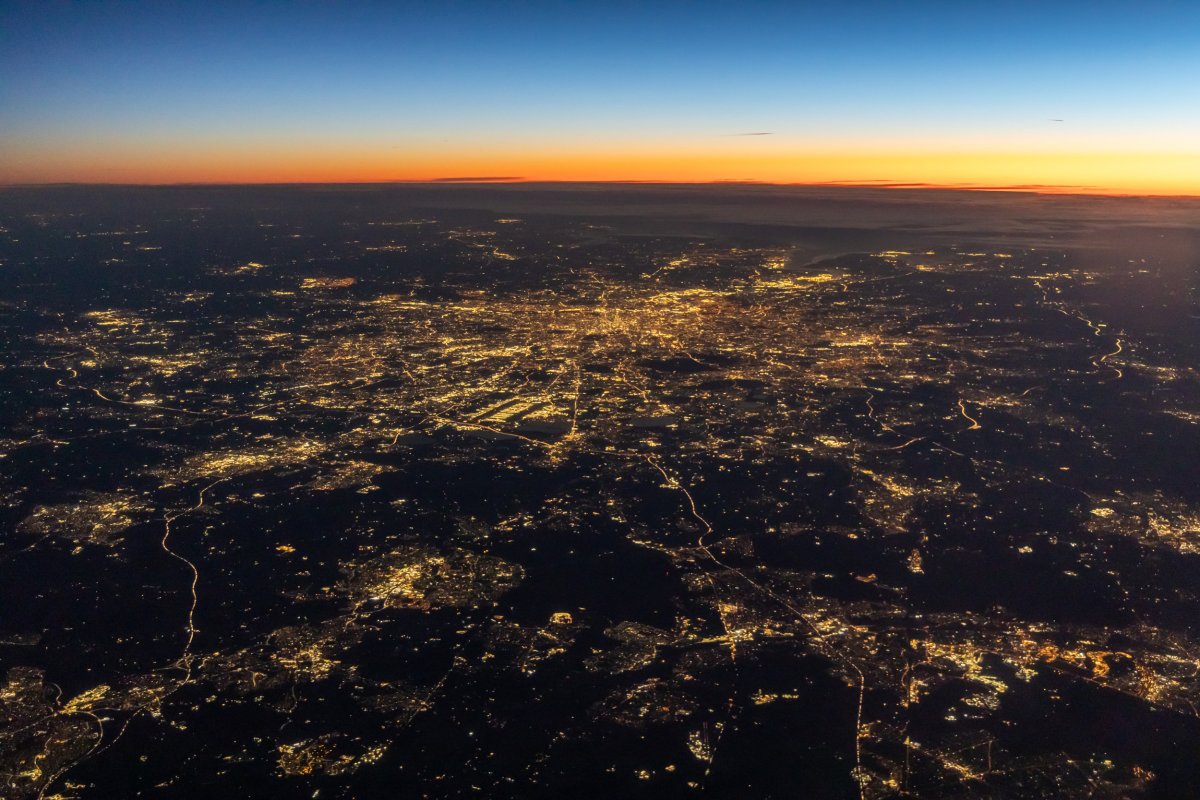 View of London from plane at dawn.