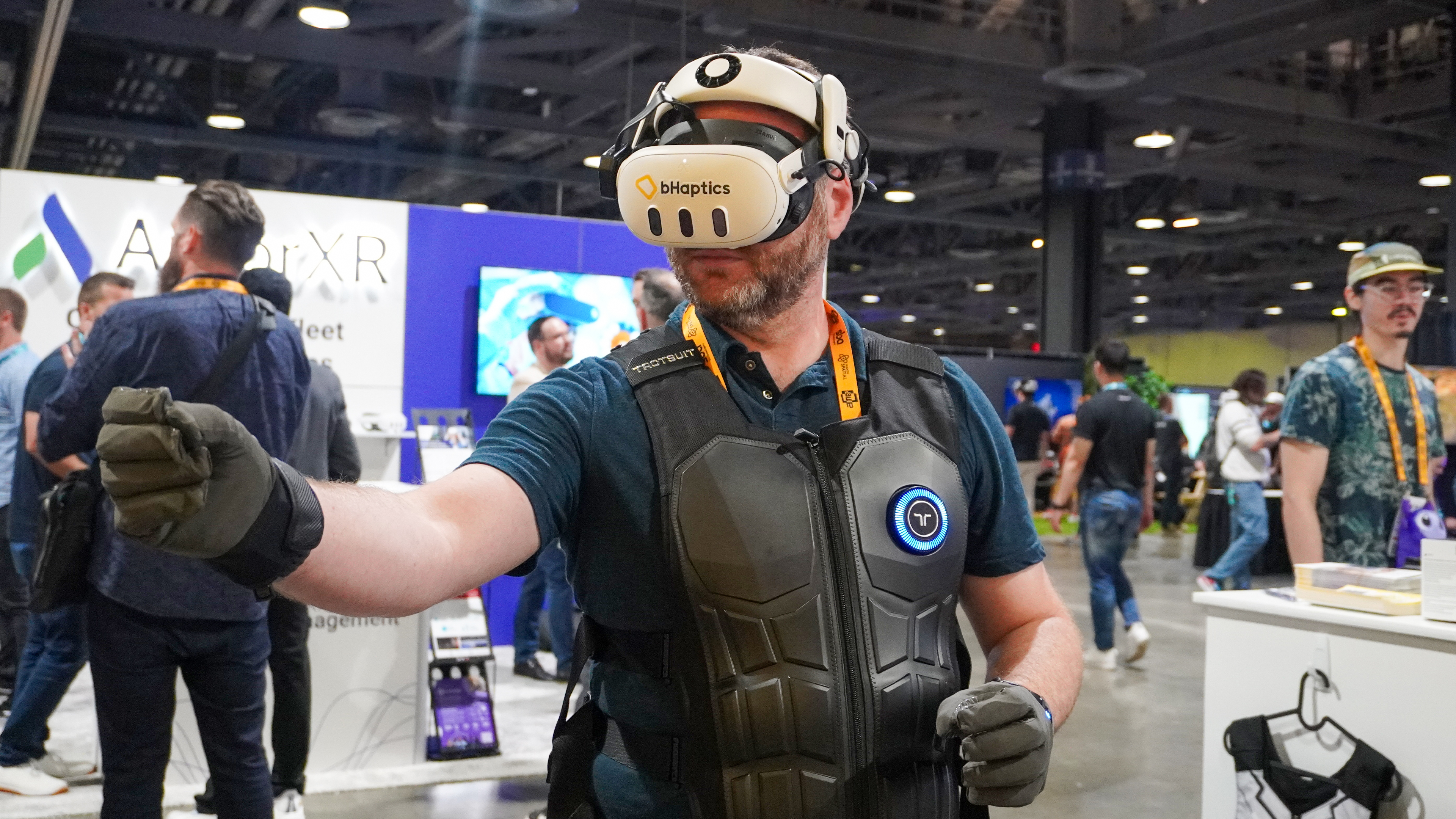 bHaptics Vr accessories: vest, gloves, sleeve with Meta headset at AWE 2025
