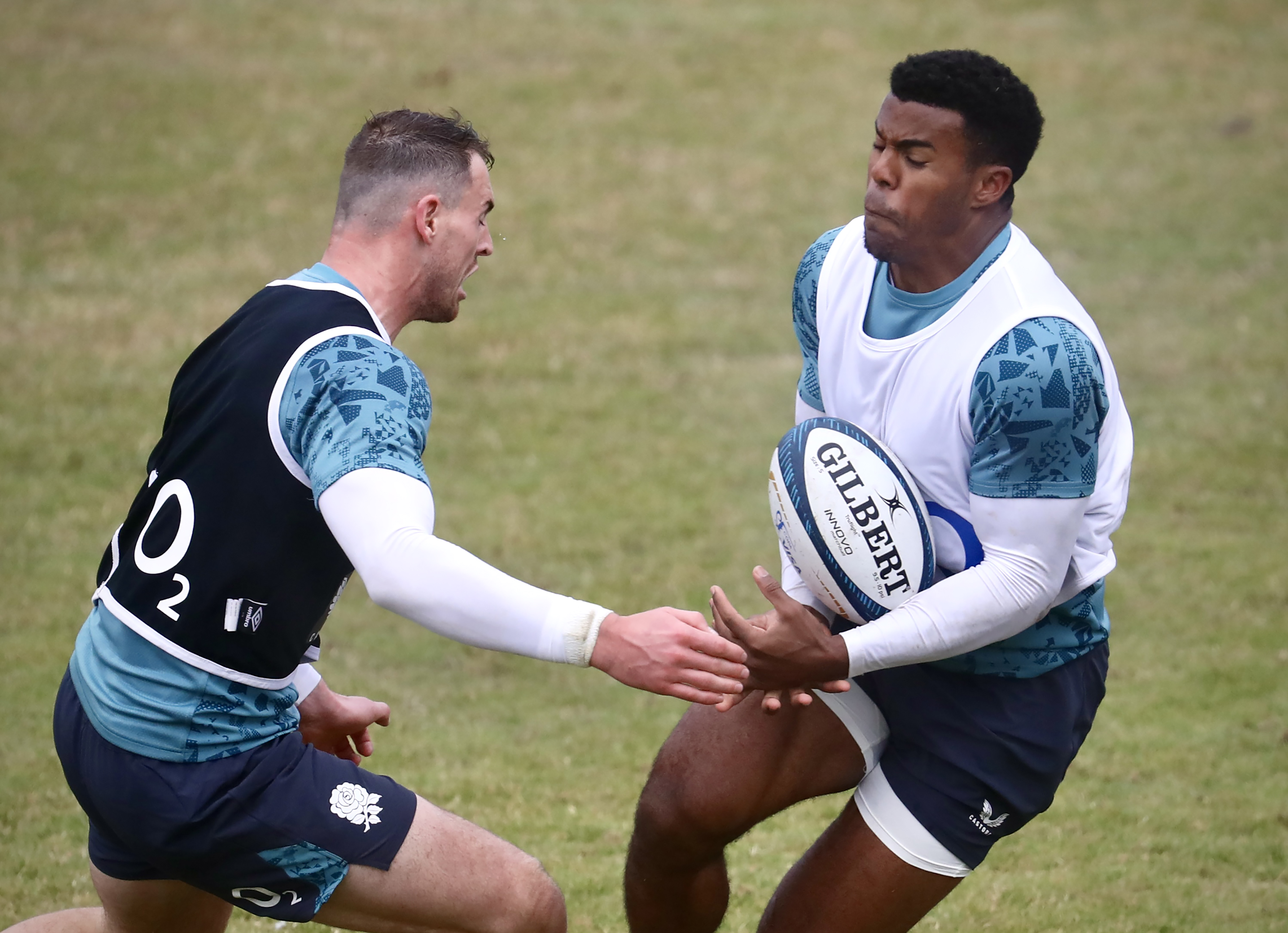 Immanuel Feyi-Waboso runs with the ball during England's training session