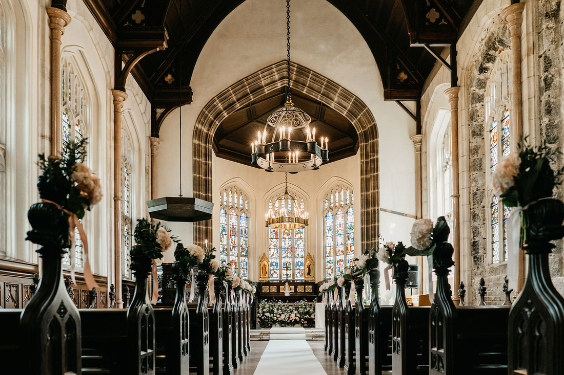 Decorated church pews and altar area.