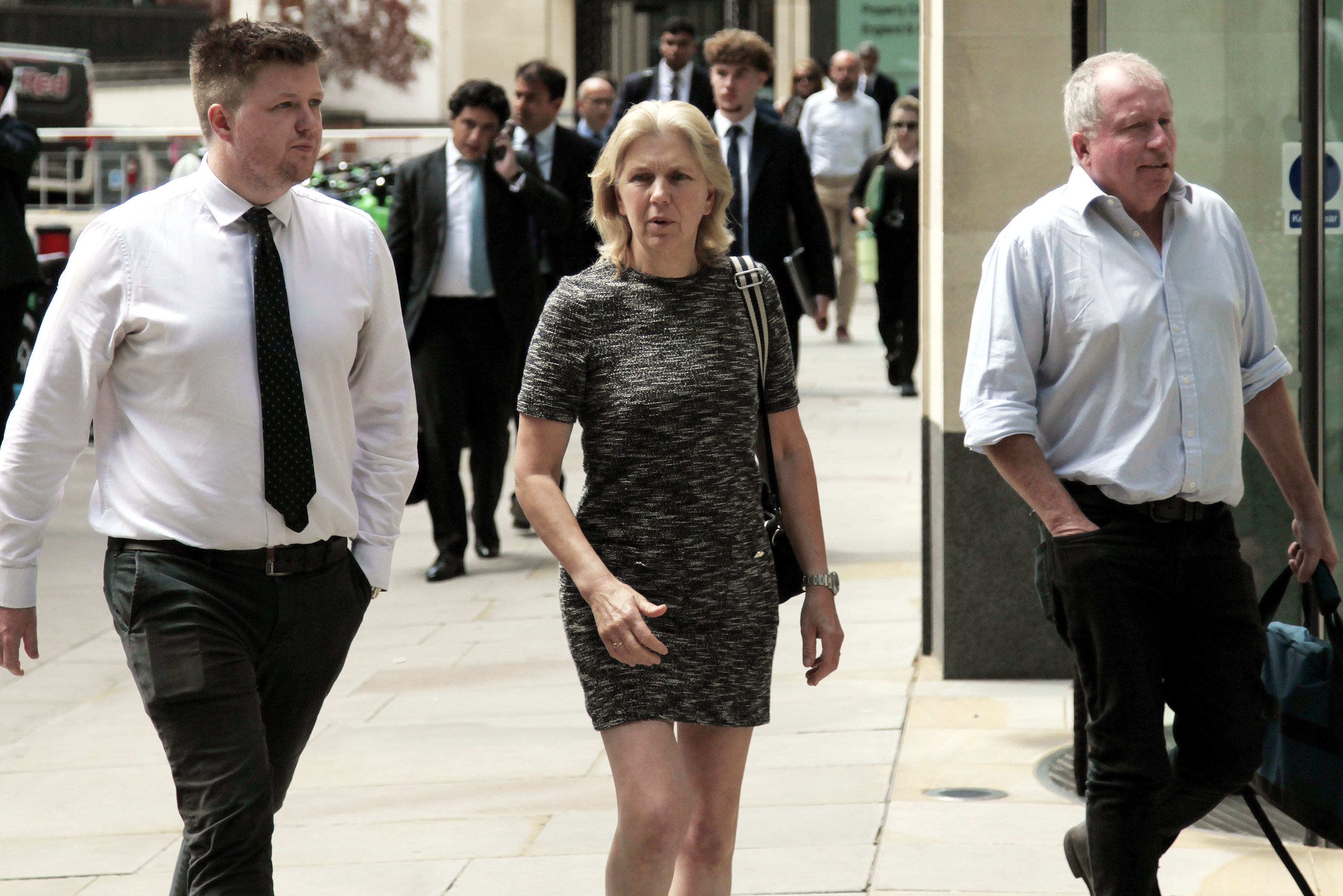 Jennifer Scott and her son, Gordon Redgrave-Scott, outside a High Court.