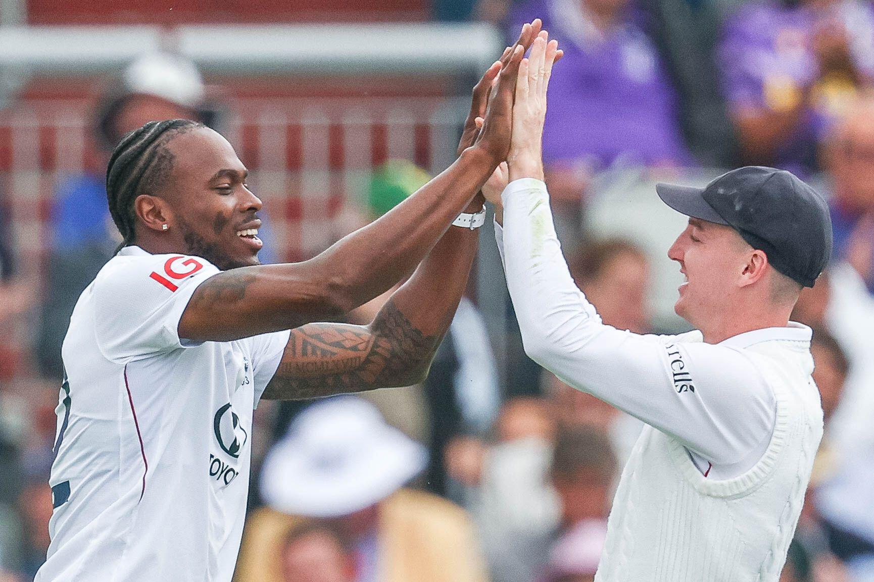 22, Jofra Archer of England & 88, Harry Brook of England celebrates taking the wicket of 8, Ravindra Jadeja of India during Day 2 of the Fourth Rothesay Test match between England and India at Old Trafford, Manchester on Thursday 24th July 2025. (Pho