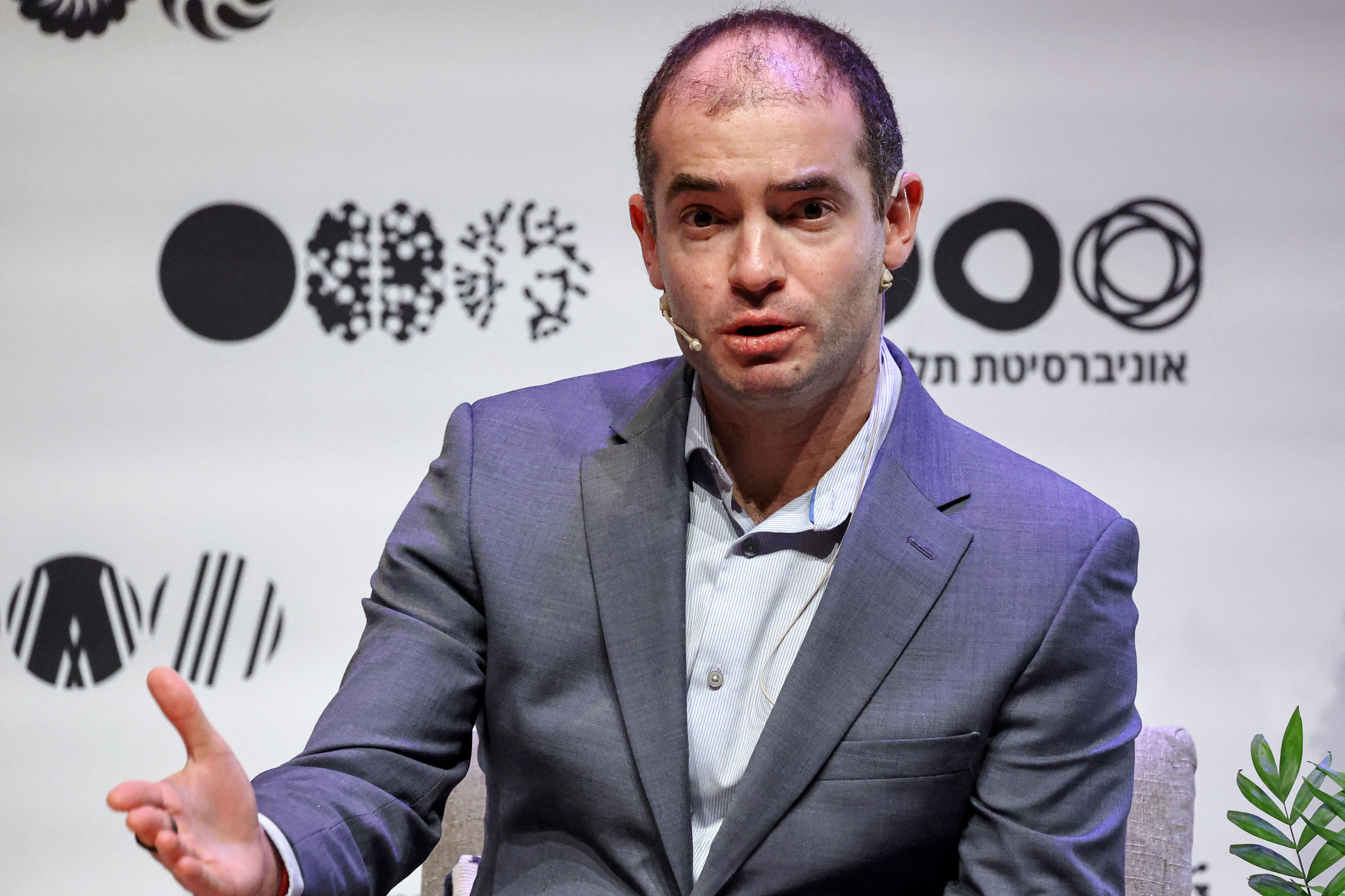Ilya Sutskever speaking at Tel Aviv University.